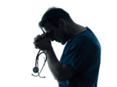 doctor man praying silhouette portrait